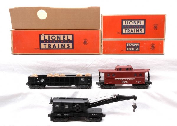 Lionel 6460 Crane MINT 6462 Gondola 6417 LN OBs: Lionel postwar 6460 operating work crane with original cardboard insert, 6462 black NYC gondola with six wooden barrels and 6417 Pennsylvania caboose in OBs. The crane has been test run, C9 and the go