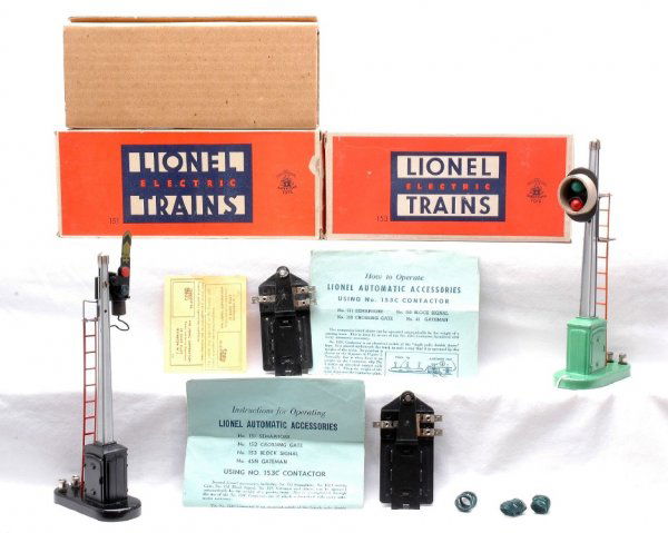 Lionel 151 Semaphore MINT 153 Block Signal LN OBs: Lionel postwar 151 semaphore in OB with original cardboard insert, 153C contactor, three coil wires and instruction sheet. The semaphore is C9. The OB has all flaps attached with one interior flap det