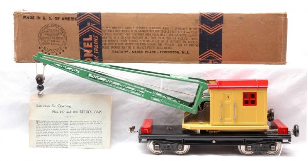 Lionel 219 Derrick Car with Yellow Cab MINT OB: Lionel prewar standard gauge 219 derrick car in OB with instruction sheet. The derrick has a yellow cab, light green boom, red roof windows and tool boxes, nickel journals and handrails and black knob