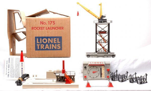 Lionel 175 Rocket Launcher LIKE NEW Boxed: Lionel postwar 175 rocket launcher complete in OB with original cardboard inserts and instruction sheet. The rocket launcher is C8. The OB has bright graphics, C9.
