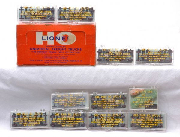 Lionel HO 0771-1 Universal Freight Trucks MINT OB: Lionel HO scale 0771-1 universal freight trucks in OB containing ten pairs of trucks in individual plastic cases. The OB indicates that there are twelve pairs so there are two sets of trucks missing.