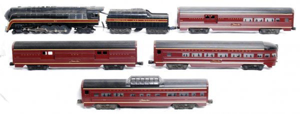 Lionel 8100 611 N&W J, four pass. cars: Lionel 8100 Norfolk and Western J class loco and tender with 578 combine, 577 baggage, 582 vista dome and 581 observation. Trains should clean C6-7.