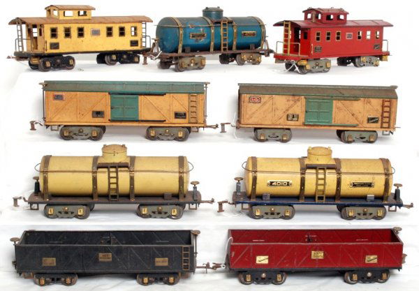 Nine Ives and American Flyer wide gauge freight: Nine prewar Ives and American Flyer wide gauge freight cars, C5-6. Two sand cars, three tanks, two boxcars and two cabooses.