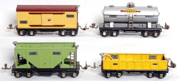 Lionel prewar O gauge 652, 653, 654, 655: Lionel prewar O gauge 652 gondola, 653 hopper, 654 Sunoco tank and 655 boxcar, nice C6-7.