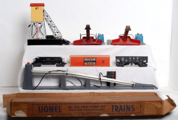 Lot of Lionel postwar operating accessories: Lot of Lionel postwar operating accessories, some in original boxes. No. 456 coal ramp with controller in OB with inserts. 397 coal loader in OB with broken and deteriorated base. 97 coal elevator, no