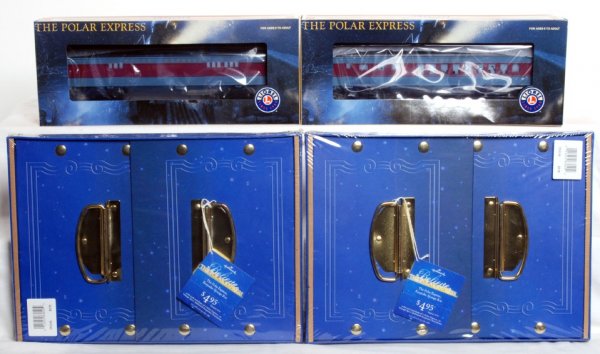 Lionel 25134 & 25135 The Polar Express passengers: Lionel The Polar Express 25134 diner and 25135 baggage, passenger cars in original boxes, C9-10. Included are two Hallmark The Polar Express Keepsake Storage boxes, in factory sealed packaging, C10.