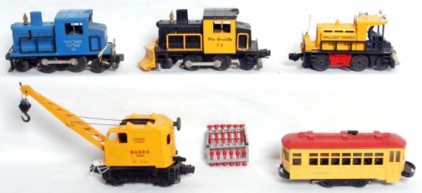 Lionel 3360, 51, 54, 60, 53 motorized units: Lionel 3360 Burro crane with hairline at screw, 51 Navy Yard switcher with broken shell at screw, 54 track ballast tamper with broken tamper, blue letter two piece bumper 60 trolley and 53 Rio Grande 