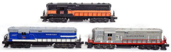 Three Lionel GP-7 locos, 2328, 2337, 2338: Three Lionel GP-7 locos, 2328 Burlington C6, 2337 Wabash small hairline in roof O/W lower C7, 2338 Milwaukee Road (interrupted band) C7.