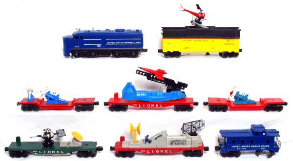 Lionel 212, 3619, 3540, 6650, 3519, 6017-50, more: Lionel 212 U.S. Marine Corps Alco A unit, 3619 helicopter reconnaissance car, 3540 radar car, two unnumbered turbo missile launcher cars, 6650 rocket launcher, 3519 satellite launching car and 6017-50