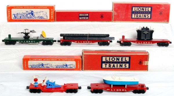 Lionel 3519, 6818, 6801, 6802, 3349 in OB: Lionel 3519 automatic satellite launching car, 6818 flatcar w/transformer, 6801 flatcar w/boat, 6802 flatcar w/girders and 3349 turbo missile launching car in original boxes, cars look C6-7. Satellite