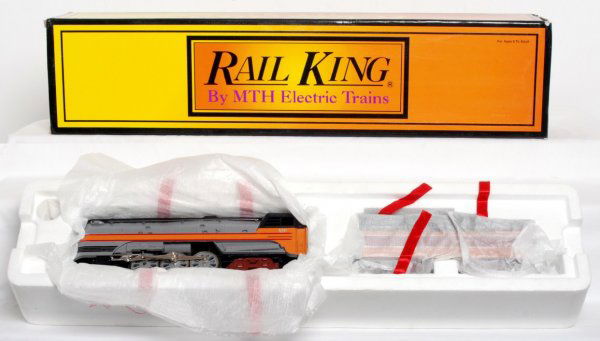 Railking Milwaukee Hiawatha Hudson: Railking by MTH Milwaukee Road Hiawatha Hudson. This classic loco features whistle, Protosmoke, and a diecast body. Item number is 30-1127-0. Shows signs of some minor track time, but is in great cond