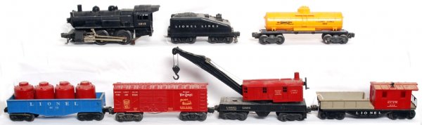 Lionel 1615 switcher, 6015, 6112, 638-2361, more: Lionel postwar 1615 steam switcher with slope back tender, 6015 Sunoco tank, 6112 gondola with four red canister, 638-2361 Van CampÕs boxcar, unnumbered work crane and 6119 Delaware, Lackawanna and W
