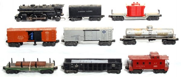 Lionel 1655 loco, 6654W tender, 2461, 3454, more: Lionel postwar 1655 steam loco and 6654W tender with 2461 transformer car missing two insulators, 3454 Pennsylvania automatic merchandise car, 3464 New York Central operating boxcar, 2555 Sunoco tank 