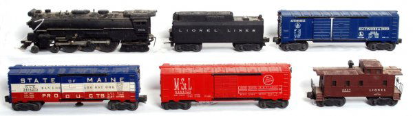 Lionel 665 loco, 6026W tender, w/4 freight cars: Lionel postwar 665 steam loco and 6026W tender with 6468 Baltimore and Ohio double door boxcar, 3494-275 State of Maine operating boxcar, 6464-525 Minneapolis and St. Louis boxcar and 6557 smoking cab