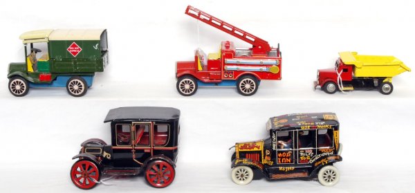 Five tin vehicles, some friction, some windup: Five tin vehicles, some friction, some windup. Marx windup Old Jalopy, Japan T-152 friction powered car, unmarked dump truck friction powered, unmarked friction powered ladder fire truck and unmarked 