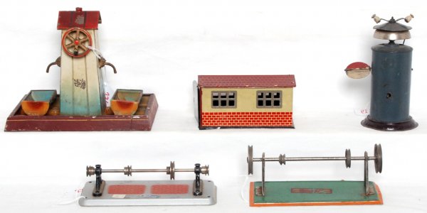 Five tin toys, well, bell ringing signal...: Wilesco and Weeden hot air/steam power transfers, European windup bell ringing signal, steam powered well and tin Garage made in Germany. Please view the photographs for the best description and as to