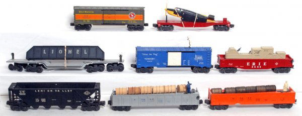 Lionel 3444, 3562-75, 3562-25, 3424, more: Lionel postwar O gauge 3444 animated gondola, 3562-75 A.T.S.F. barrel car with chipped shell and six wooden barrels, 3562-25 A.T.S.F. barrel car with six wooden barrels, 3424 Wabash operating brakeman