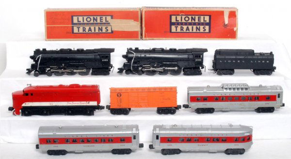 Two Lionel 2055, 210 with freight and passengers: Two postwar Lionel O gauge 2055 steam locos and an unnumbered tender with whistle, 210 MKT The Texas Special dummy Alco A unit, X6004 Pennsylvania Baby Ruth boxcar, 2442 Clifton vista dome, 2444 Newar