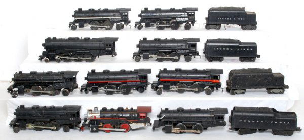 Mixed group of Lionel and Marx locos and tenders: Nine Lionel postwar O gauge locos: 2055, 2034, 242, 250, 237, 246 and 1651. Four postwar tenders: 6466WX, 2671W, one unnumbered whistle tender and one unnumbered tender without whistle. Lionel modern