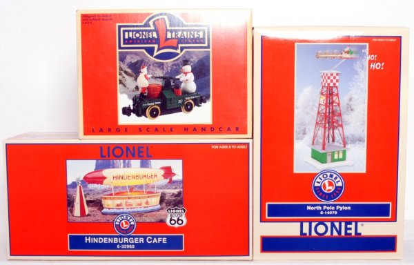 Lionel Hindenburger Cafe, N. Pole Pylon, Hand Car: Lot includes 14079 North Pole Pylon unopened and in OB. 32960 Hindenburger Cafe unopened in OB. 87212 Santa and Snowman large scale hand car has seen minor track time but is complete and in OB. Handca