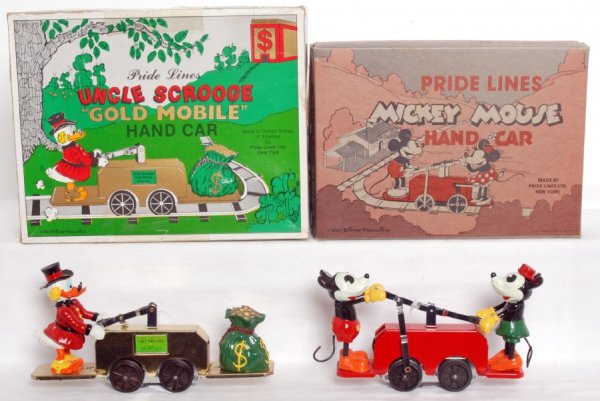 Pride Lines 1985 Hand car and 1100 hand car: Two pride lines hand cars. Number 1985 Uncle Scrooge and 1100 Mickey Mouse. Both cars in OBÕs with all instructions and track originally included. Both show some run time, but are in very good condit