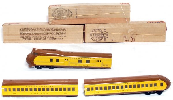 Lionel prewar 752W, 753 and 754 in OB: Lionel prewar O gauge Union Pacific City of Portland streamlined diesel passenger train with 752W powered unit, 753 coach and 754 observation car. Belly pans are repainted but appear to be excellent c