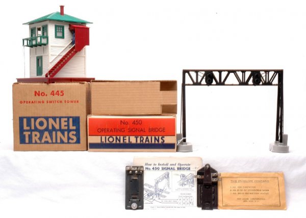 Lionel 450 Signal Bridge 445 Switch Tower LN OBs: Lionel postwar 450 operating signal bridge in OB with original cardboard insert, packet, 153C contactor and instruction sheet. The bridge is C8. Also included is a 445 operating switch tower in OB wit