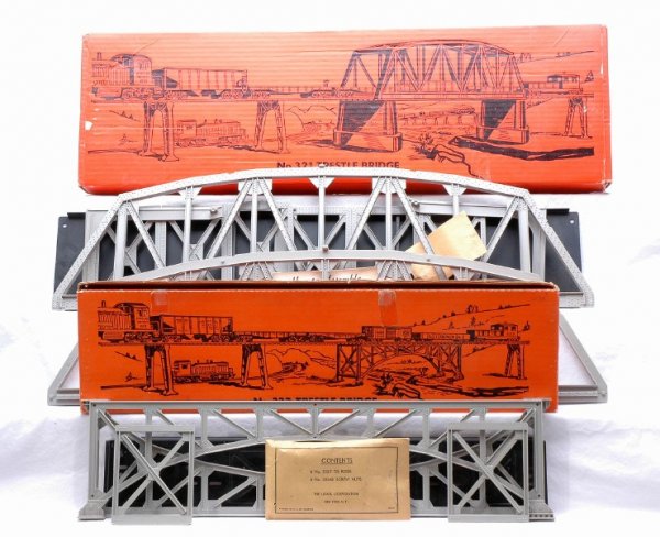 Lionel 321 and 332 Trestle Bridges MINT Boxed: Lionel postwar 321 trestle bridge and 332 trestle bridge in orange OBs. The accessories are C9. The OBs have tape and tape residue, otherwise they have bright graphics, C8.