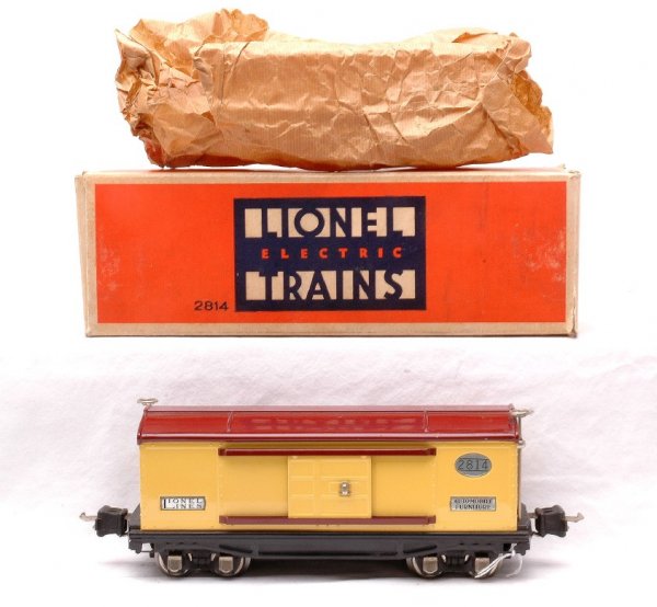Lionel 2814 Cream Boxcar w/Maroon Roof LN OB: Lionel prewar O gauge 2814 cream boxcar with maroon roof and door guide, nickel plates, trim and journals in OB with original wrap. The paint is bright and clean, C8. The OB has all flaps attached and