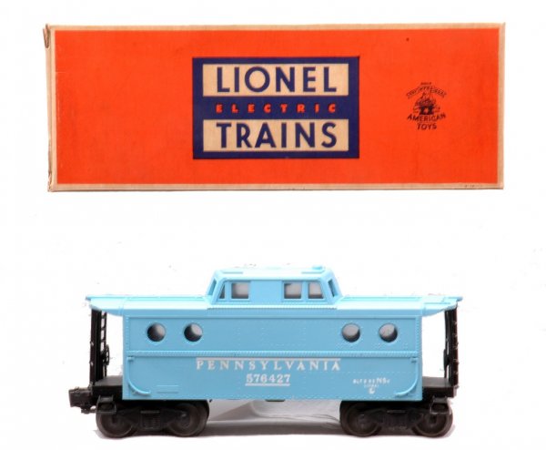 Lionel 6427-500 Blue PRR Girls Caboose LN OB: Lionel postwar 6427-500 sky blue Pennsylvania girlÕs set caboose in OB. The color on the caboose is very clean with strong stamping. The caboose has light run time, C8. The OB is a brick and has all 