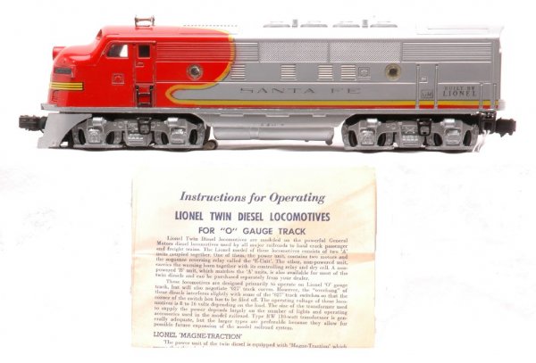 Lionel 2353P Santa Fe F3 Powered A Unit LN: Lionel postwar 2353P Santa Fe F3 powered A unit with instruction sheet. The loco has some box rub and cracks in nose decal, C7-8.