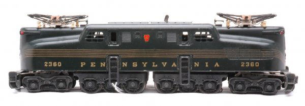 Lionel 2360 Green Pennsy GG-1 w/5 Stripes LN: Lionel postwar 2360 green Pennsylvania GG-1 loco with five stripes. The lettering is strong and the striping is consistent. The loco has nicks along bottom edge of cab and one scratch on side. The die