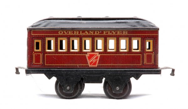 Hafner Pennsylvania Passenger Car w/4 Wheels: Hafner prewar O gauge 5 1/2 inch lithographed Pennsylvania passenger car with four wheels. Car is maroon with a black roof and frame. The car is lettered in gold OVERLAND FLYER and has a Pennsylvania 