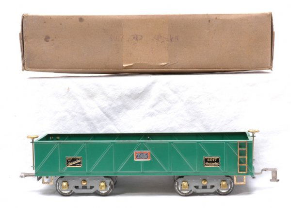 Am Flyer Prewar 4017 Green Sand Car LN Boxed: American Flyer prewar wide gauge 4017 green sand car with gray flex trucks OVER 7 MILLION HAPPY OWNERS name plate in OB. One top edge of the sand car has spots of rust. The rest of the sand car is C8.