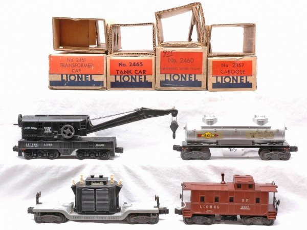 Lionel 4 Freights 2460 2461 2465 2357 LN Boxed: Lionel postwar four freight cars; 2460 operating Bucyrus Erie crane car, 2461 transformer car with all insulators intact, 2465 silver Sunoco two dome tank and 2357 Tuscan caboose with smokestack all i