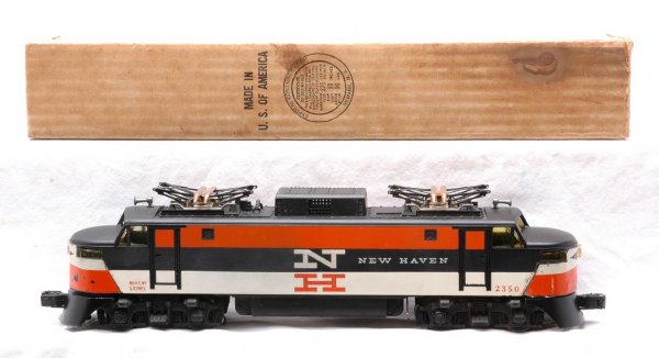 Lionel 2350 New Haven EP-5 Diesel Boxed: Lionel postwar 2350 New Haven EP-5 diesel in OB. This is the version with the decaled nose and the white N and orange H. The decals have some flaking, otherwise is C7-8. The OB has all flaps attached 