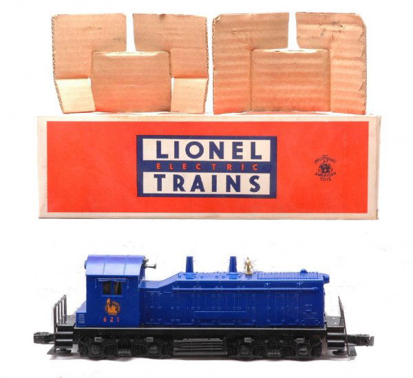 Lionel 621 Jersey Central NW2 Switcher LN OB: Lionel postwar 621 Jersey Central NW2 switcher in OB with two original cardboard inserts. Switcher is C7-8. OB has all flaps attached and is damaged on the side.