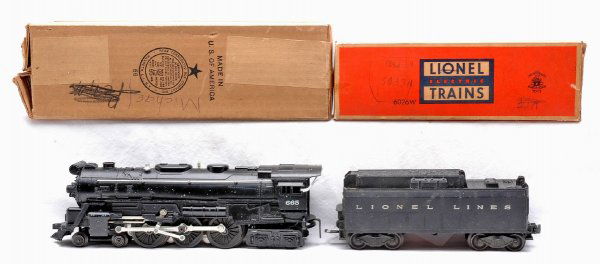 Lionel 665 Santa Fe-Type Hudson Loco 6026W OBs: Lionel postwar 665 Santa Fe-type Hudson 4-6-4 steam loco with 6026W tender both in OBs. The loco and tender are C7. The loco OB is sealed on one end. Both OBs have all flaps attached with writing.