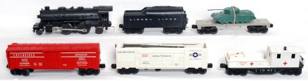 Lionel postwar O gauge Sears 9820 military set: Lionel postwar O gauge Sears 9820 military set components. 240 loco has good marker lights but one of the tiny little steps on the pilot is broken, C6-7. Tough 3666 Minuteman boxcar, body is C7 but is