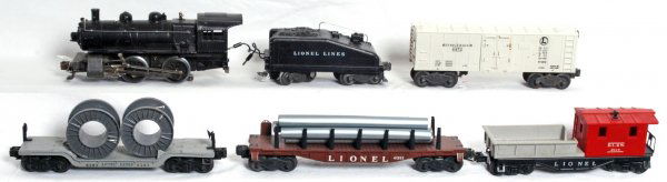 Lionel 0-4-0, 6403B, 6472, 6561, 6511, 6119: Lionel 0-4-0 steam switcher missing numbers, 6403B slopeback tender, 6472 reefer, 6561 cable reel car with two gray reels missing one brake wheel, 6511 flatcar with five pipes and 6119 Delaware, Lacka