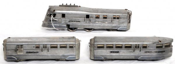 American Flyer 9900 Burlington Zephyr passenger: American Flyer prewar O gauge 9900 Burlington Zephyr streamline passenger train with powered unit, REA baggage and 9900 observation cars, loco has some hairlines in roof trim, nice C6+.