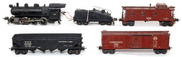 Lionel prewar 227, 2227B, 2956, X2954, 2957: Lionel prewar O gauge 227 0-6-0 steam switcher and 2227B tender (rewired and detached coupler key) with 2956 Baltimore and Ohio hopper (missing one bay door), X2954 Pennsylvania boxcar (cracked and re