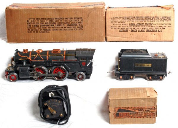 Lionel prewar standard gauge 385E steam, OB: Lionel prewar standard gauge 385E steam loco and tender. Both are gray. Nice original C7+, steam chest has been replaced. Loco box C7, 385W tender box is C7+. Lot includes a boxed Type A transformer.