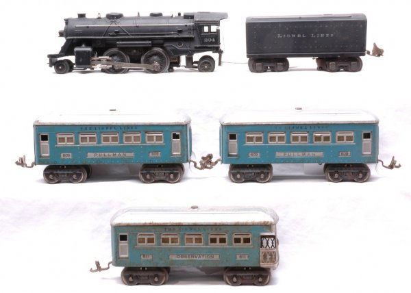 Lionel Uncatalogued 7114 204 1689T 609 609 611: Lionel prewar O gauge uncatalogued blue passenger set no. 7114, circa 1941 containing; 204 black 2-4-2 steam loco, 1689T, two 609 Pullmans and 611 observation. The cars have silver roofs and inserts.