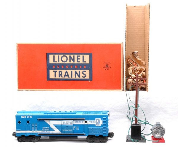Lionel 3530 Operating Generator Car MINT Boxed: Lionel postwar 3530 operating generator car in OB with original cardboard insert, wrap, telephone pool, searchlight and instruction sheet. The car has never been run, C9. The OB has all flaps attached