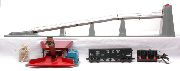 Lionel 456 Ramp w/3456 Hopper and 397 Loader: Lionel postwar 456 coal ramp with a 3456 operating Norfolk and Western hopper, 207 bag of coal and a 456C controller. Also included is a 397 coal loader. There is one string broken on the 456 coal ram