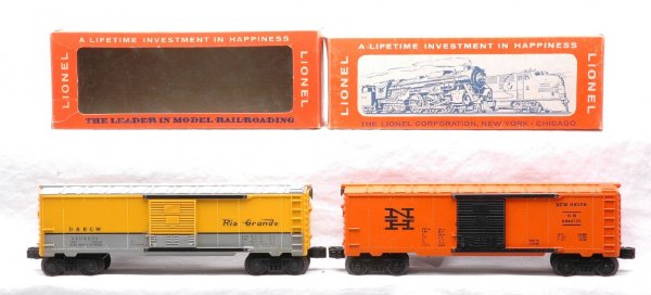 Lionel 6464-650 D&RGW 6464-725 NH Boxcars OBs: Lionel postwar 6464-650 D & RGW type IV boxcar, circa 1966 and a 6464-725 orange New Haven type IV boxcar, both in OBs. The New Haven is in a correct box marked 6464-735. Both cars are C7. The 6464-65