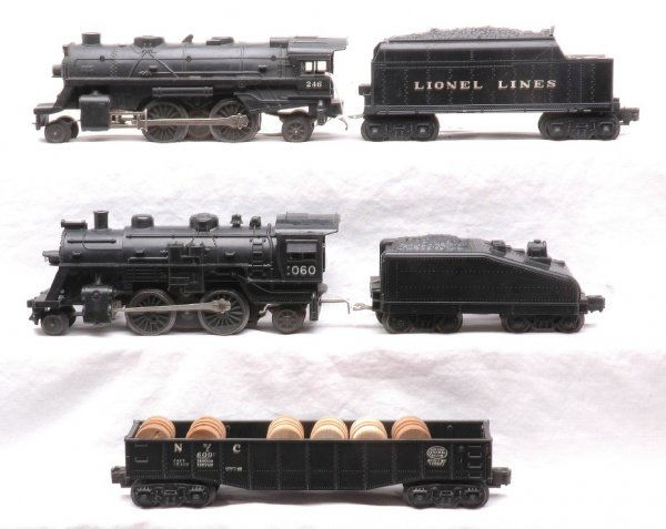 Lionel 1060 Loco 1060T 246 Loco 6066T 6002: Lionel postwar 1060 black 2-4-2 steam loco with a 1060T slope back tender, 246 black 2-4-2 steam loco and a 6066T tender. Also included is a 6002 NYC black gondola with wooden barrels.