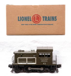 Lionel 42 Picatinny Arsenal Switcher LIKE NEW: Lionel postwar 42 Picatinny Arsenal switcher in a reproduction OB. One strut is cracked but still intact, C7-8.