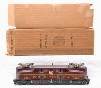 Lionel 2360 Pennsylvania GG-1 Loco LN OB: Lionel postwar 2360 Pennsylvania Tuscan GG-1 loco with single gold stripe and decals in OB with original cardboard insert. Both decals are cracked but are intact. The loco is C7-8. The OB has all